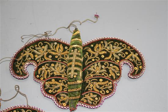 A pair of Chinese metal thread embroidered green velvet butterfly decorations, W. 17cm